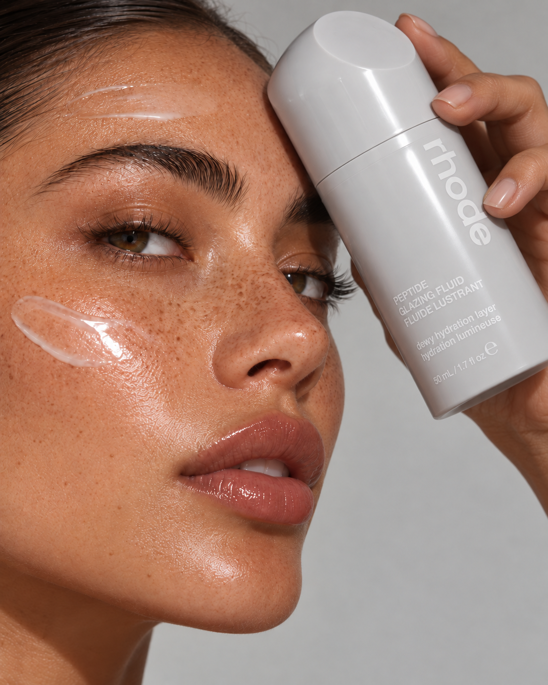 In use direction — the same skincare fluid bottle
