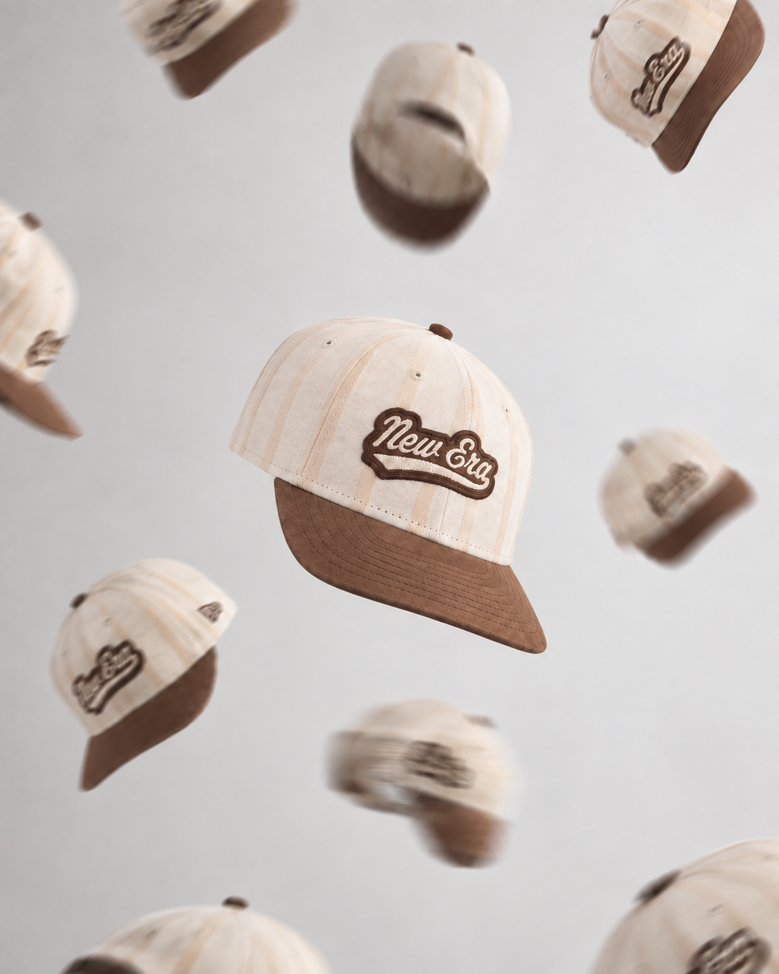 Cap campaign visual — a sharp levitating cap among blurred, flying caps